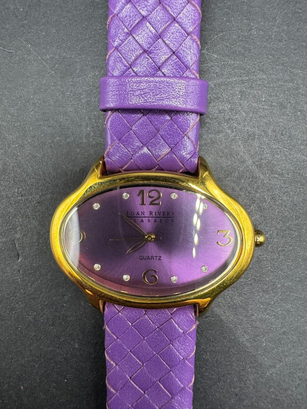 Joan Rivers Womens Watch 39mm Oval Purple Dial Gold Tone Woven Leather Band